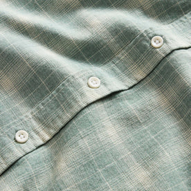 material shot of the buttons on The California in Sea Moss Plaid, Wovens by Taylor Stitch