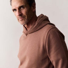 fit model showing the side of The Cotton Hemp Hoodie in Faded Brick, Knits by Taylor Stitch