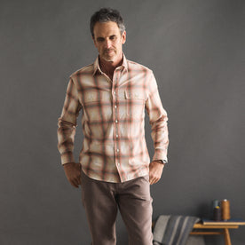 fit model posing in The Craftsman Shirt in Brick Shadow Plaid, Wovens by Taylor Stitch