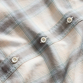 material shot of the buttons on The Craftsman Shirt in Sky Shadow Plaid, Wovens by Taylor Stitch