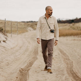 fit model walking in The Division Shirt in Birch, Wovens by Taylor Stitch