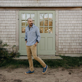 fit model walking in The Division Shirt in Washed Indigo, Wovens by Taylor Stitch