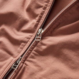 material shot of the two-way zipper on The Flint Jacket in Faded Brick Broken Twill, Outerwear by Taylor Stitch