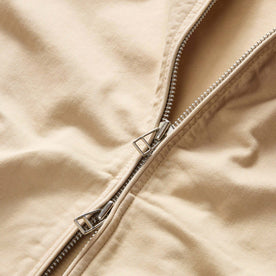 material shot of the two-way zipper on The Flint Jacket in Light Khaki Broken Twill, Outerwear by Taylor Stitch