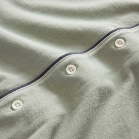 material shot of the buttons on The Harwich Shirt in Surf Green Tipped Pique, Knits by Taylor Stitch