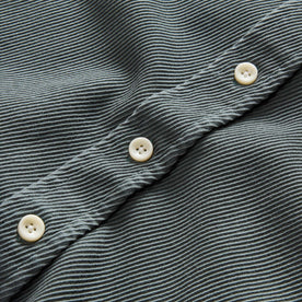 material shot of the buttons on The Ledge Shirt in Deep Sea Twill, Wovens by Taylor Stitch