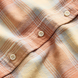 material shot of the natural colored buttons on The Ledge Shirt in Sunrise Plaid, Wovens by Taylor Stitch