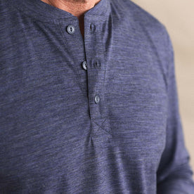 fit model showing off the buttons on The Merino Henley in Heather Navy, Knits by Taylor Stitch