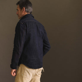 fit model showing the back of The Mill Shirt Jacket in Kuroki Slub Denim, Outerwear by Taylor Stitch