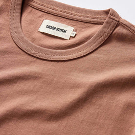 material shot of the ribbed neck opening on The Organic Cotton Tee in Faded Brick, Knits by Taylor Stitch