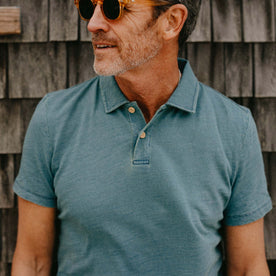 fit model showing off the collar on The Organic Cotton Polo in Washed Indigo, Knits by Taylor Stitch