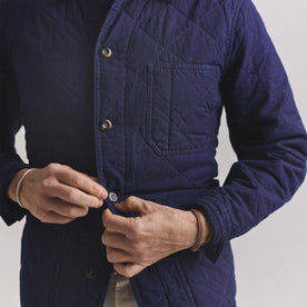 fit model buttoning up The Ojai Jacket in Indigo Diamond Quilt, Outerwear by Taylor Stitch