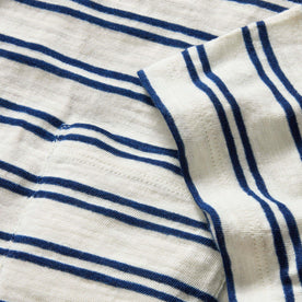 material shot of the sleeve and pocket on The Organic Cotton Tee in Washed Indigo Stripe, Knits by Taylor Stitch