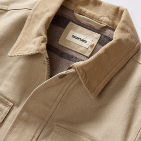 material shot of the corduroy collar on The Workhorse Utility Jacket in Light Khaki Chipped Canvas, Outerwear by Taylor Stitch