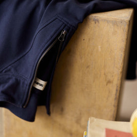 editorial image of the zipper on The Rugby Quarter Zip in Faded Navy, Knits by Taylor Stitch