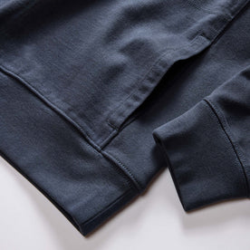 material shot of the pocket on The Rugby Quarter Zip in Faded Navy, Knits by Taylor Stitch