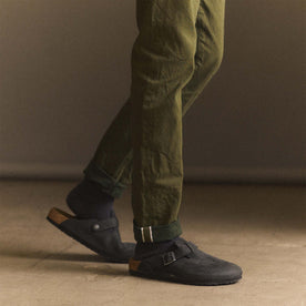 fit model showing selvage cuffs on The Slim Jean in Olive Nihon Menpu Selvage, Bottoms by Taylor Stitch