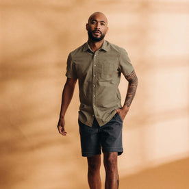 fit model posing in The Short Sleeve California in Heather Moss Cord, Wovens by Taylor Stitch