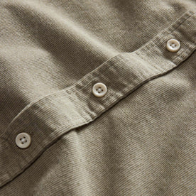 material shot of the buttons on The Short Sleeve California in Heather Moss Cord, Wovens by Taylor Stitch