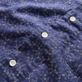 material shot of the buttons on The Short Sleeve Hawthorne in Dark Navy Floral, Wovens by Taylor Stitch