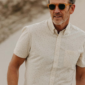 fit model showing the front of The Short Sleeve Jack in Heather Oat Dot, Wovens by Taylor Stitch