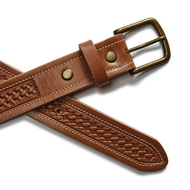 flatlay of the clasp on The Tooled Belt in Saddle Tan, Accessories by Taylor Stitch