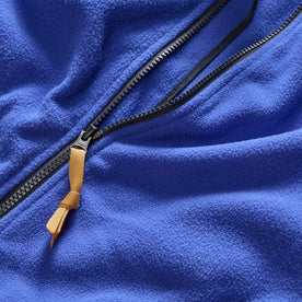 material shot of the YKK zipper and zipper pull on The Trail Fleece in Alpine Dusk, Outerwear by Taylor Stitch