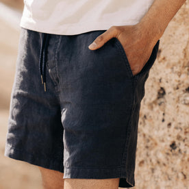 fit model standing with his hand in the pocket of The Apres Short in Granite Hemp, Bottoms by Taylor Stitch