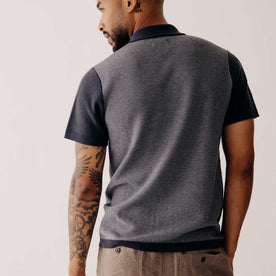 fit model showing the back of The Button Down Polo in Marine Seed Stitch, Knits by Taylor Stitch