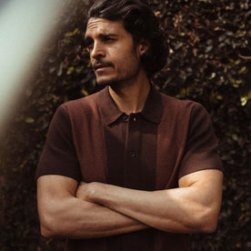 fit model crossing his arms in The Button Down Polo in Morita Seed Stitch, Knits by Taylor Stitch