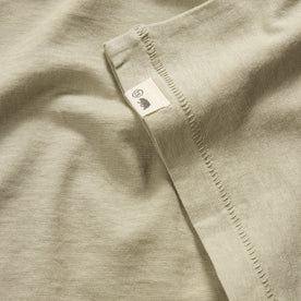 material shot of the sleeve on The Cotton Hemp Tee in Sage, Knits by Taylor Stitch