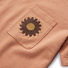 material shot of the chest pocket on The Embroidered Heavy Bag Tee in Dried Acorn Aubade, Knits by Taylor Stitch