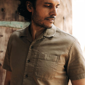 fit model showing the camp collar on The Short Sleeve Hawthorne in Sea Moss, Wovens by Taylor Stitch