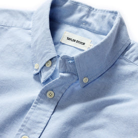 material shot of the buttons on The Jack in Blue Everyday Oxford, Wovens by Taylor Stitch