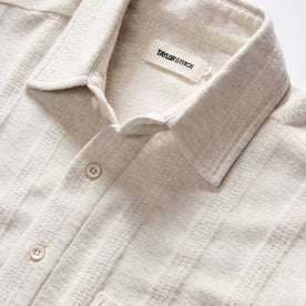 material shot of the collar on The Short Sleeve California in Heather Ash Pointelle Stripe, Wovens by Taylor Stitch