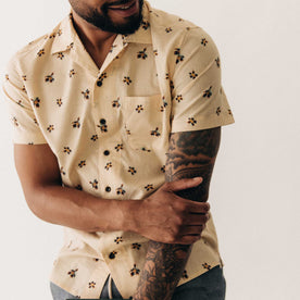 fit model posing in The Short Sleeve Hawthorne in Almond Floral, Wovens by Taylor Stitch