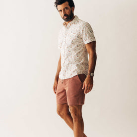 fit model wearing The Apres Short in Fired Brick Dobby, Bottoms by Taylor Stitch