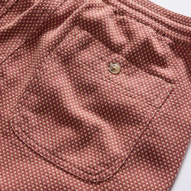 material shot of the back pocket on The Apres Short in Fired Brick Dobby, Bottoms by Taylor Stitch