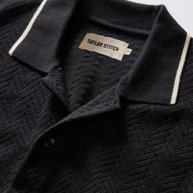 material shot of the collar on The Button Down Polo in Coal Herringbone, Knits by Taylor Stitch