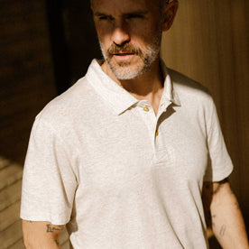 fit model showing off the collar on The Cotton Hemp Polo in Heather Oat, Knits by Taylor Stitch