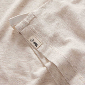 material shot of the logo on The Cotton Hemp Polo in Heather Oat, Knits by Taylor Stitch