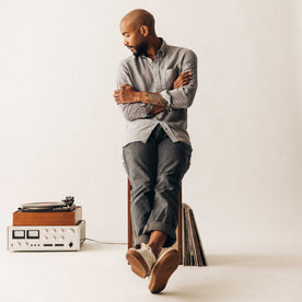 fit model sitting wearing The Jack in Overcast Linen, Wovens by Taylor Stitch