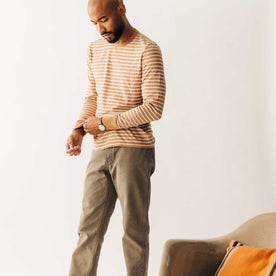 fit model posing in The Organic Cotton Long Sleeve Tee in Churro Stripe, Knits by Taylor Stitch