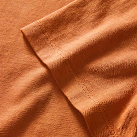 material shot of the sleeves on The Organic Cotton Tee in Adobe, Knits by Taylor Stitch