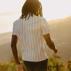 fit model walking wearing The Short Sleeve Davis Shirt in Sandbar Stripe, Wovens by Taylor Stitch