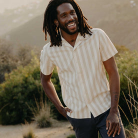 fit model posing in The Short Sleeve Davis Shirt in Sandbar Stripe, Wovens by Taylor Stitch