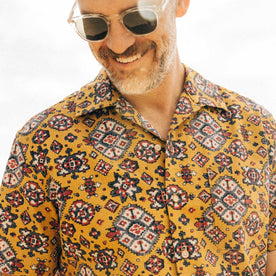 fit model showing off collar on The Short Sleeve Davis Shirt in Tarnished Gold Print, Wovens by Taylor Stitch