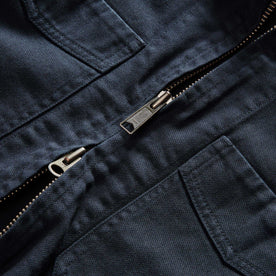 material shot of the two-way zipper on The Station Jacket in Dark Navy Broken Twill, Outerwear by Taylor Stitch