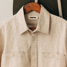 editorial image of The Utility Shirt in Natural Nep on a hanger, Wovens by Taylor Stitch