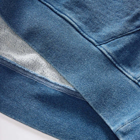 material shot of the bottom of The Apres Hoodie in Washed Indigo Terry, Knits by Taylor Stitch